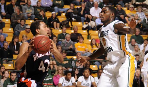 Bryon Allen defends Bucknell's Cameron Ayers in last season's 61-57 win at the Patriot Center (Photo courtesy of George Mason Athletics)