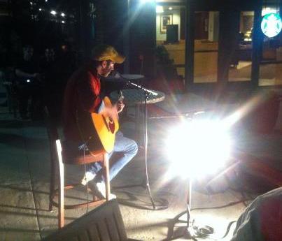 A Mason student shares his guitar talents in the Live @ Starbucks series (photo courtesy of Audrey Mattaino).