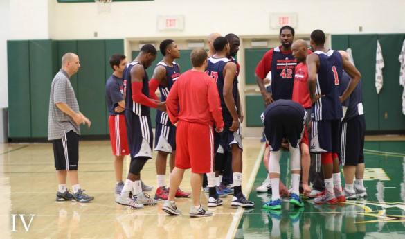 The Washington Wizards huddle at the conclusion of practice (Photo by John Irwin). 